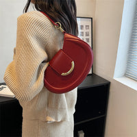 Petit sac bandoulière en simili cuir avec anse courte