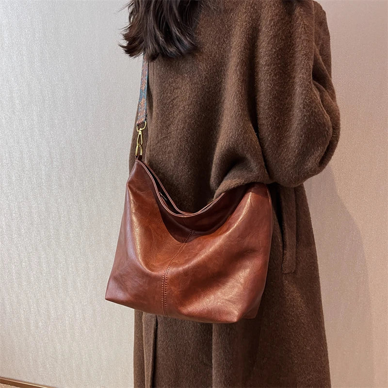 Sac bandoulière en simili cuir à sangle en tissu