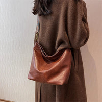 Sac bandoulière en simili cuir à sangle en tissu
