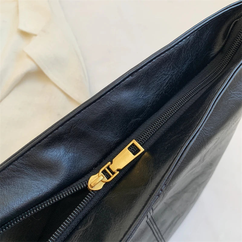 Sac bandoulière en simili cuir à sangle en tissu