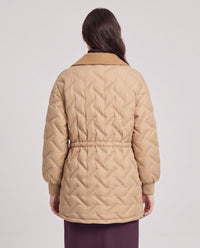 Veste matelassée mi-longue à grand col tailleur