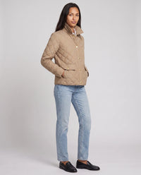 Veste matelassée à col chemise et pressions dorées