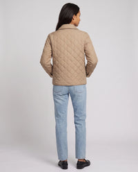 Veste matelassée à col chemise et pressions dorées