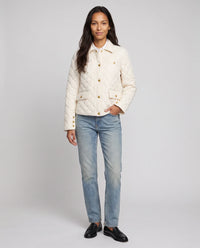 Veste matelassée à col chemise et pressions dorées