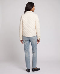 Veste matelassée à col chemise et pressions dorées