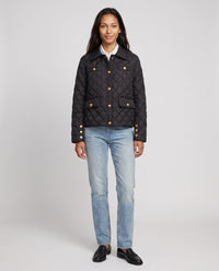 Veste matelassée à col chemise et pressions dorées