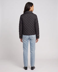 Veste matelassée à col chemise et pressions dorées