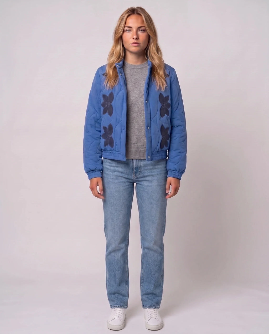 Veste matelassée col montant à pressions